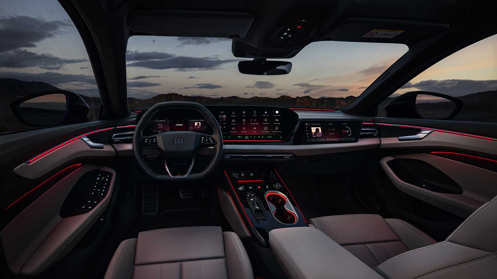 Audi A6 allroad, Cockpit mit hellen Sitzen und roter Ambientebeleuchtung